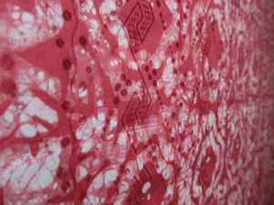Close up -Red dye bazin - Damask Fabric